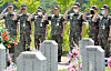 At the National Cemetery in Daejeon onThursday, Navy soldiers pay their respects to the 46 fallen sailors of the Cheonan, which is believed to have been torpedoed by a North Korean submersible in 2010, as Memorial Day approaches on Saturday. [KIM SEONG-TAE]