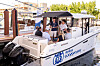 People take a ride on a boat equipped with autonomous navigation technology developed by Avikus at Fort Lauderdale, Florida, on Thursday. Avikus, HD Hyundai’s autonomous navigation subsidiary, participated in the Fort Lauderdale International Boat Show, the world’s largest boat show, and presented its autonomous ship technology. The Fort Lauderdale International Boat Show continues until Sunday. [AVIKUS]