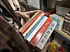 Books that Dahlia Davis, 24, picked out for herself at Tongbang Books' Open House book sale in Seongdong District, eastern Seoul, on Saturday [LEE JIAN]