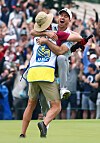 Nick Taylor of Canada celebrates with his caddie after making an eagle putt on the fourth playoff hole to win the RBC Canadian Open at Oakdale Golf & Country Club on June 11, 2023 in Toronto, Ontario. [GETTY IMAGES]