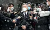 Rep. Choe Kang-wook, chairman of the Openminjoo Party, center, leaves the Seoul Central District Court on Thursday after the court convicted him of issuing false internship certificates to help former Justice Minister Cho Kuk's son apply to graduate schools. [NEWS1]