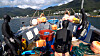 Three women divers are seen on a boat in Geoje, South Gyeongsang. [JOONGANG ILBO]