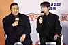 Actors Ma Dong-seok, left, and Jung Kyung-ho discuss their upcoming comedy film 'Men of Plastic' which is set to premiere Nov. 30. [YONHAP]