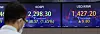 Electronic display boards at Hana Bank in central Seoul show stock and foreign exchange markets Thursday morning. [YONHAP]