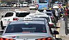 Taxis are parked in front of Seoul Station, Seoul in March 2021. The amendments to the transport service act came into effect, a year since it passed the National Assembly, on Thursday. However, mobility start-ups aren’t too happy about the changes, claiming that they restrict start-ups from trying out new business strategies while weighing them down with fees. [YONHAP]