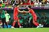 Kim Min-jae, left, is substituted by Kwon Kyung-won two minutes into the injury time of the second half during a World Cup Group H match between Korea and Ghana at Education City Stadium in Al Rayyan, Qatar, on Monday. [YONHAP]