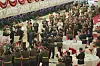 North Korean leader Kim Jong-un, his wife Ri Sol-ju and daughter Kim Ju-ae are applauded by military officers at a banquet in Pyongyang in photos released by state media on Wednesday. Kim's sister Kim Yo-jong, dressed in white, is visible at the far left side of the photo. [YONHAP]