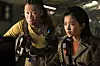 Tiger Park (played by Jin Sun-kyu), left, and Captain Jang (played by Kim Tae-ri) are immediately taken with Dorothy. [NETFLIX]