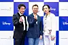From left, actor Heo Sung-tae, director Kang Yun-sung and actor Lee Dong-hwi pose at the blue carpet event for the Disney Content Showcase held at Marina Bay Sands Singapore on Thursday. [THE WALT DISNEY COMPANY]