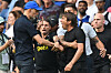 Tottenham Hotspur manager Antonio Conte, right, and Chelsea manager Thomas Tuchel clash at the end of a Premier League match at Stamford Bridge in London on August 14. [AFP/YONHAP]