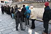 Older adults line up at a soup kitchen outside Tapgol Park in Jongno District, central Seoul, on Feb. 3. [YONHAP]
