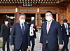 President Moon Jae-in, left, and President-elect Yoon Suk-yeol pose for a photo ahead of their first dinner meeting at the Blue House in central Seoul Monday, 19 days after the election. [JOINT PRESS CORPS]