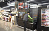 A Lotte Mart employee at the Gwanggyo branch in Suwon, Gyeonggi, prepares an order placed online. [LOTTE SHOPPING]