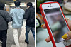 The romance scammer, middle, gets caught in act at Gongdeok Station in Mapo District, western Seoul on Feb. 15. [SCREEN CAPTURE/JOONGANG PHOTO]