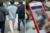 The romance scammer, middle, gets caught in act at Gongdeok Station in Mapo District, western Seoul on Feb. 15. [SCREEN CAPTURE/JOONGANG PHOTO]