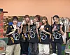 Girl group NewJeans wore black TheOpen Product T-shirts with rabbit prints in a YouTube video together earlier this week. [SCREEN CAPTURE]