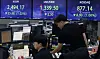Screens in Hana Bank's trading room in central Seoul show stock and foreign exchange markets open on Friday. [NEWS1]
