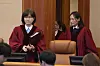 Justices Lee Mi-son, left, and Jung Jung-mi, right, enter the main chamber of the Constitutional Court in Jongno District, central Seoul, for the first formal hearing of President Yoon Suk Yeol's impeachment trial on Jan. 14. [JOINT PRESS CORPS]