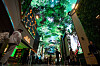 People walk along “Aurora,” a state-of-the-art digital entertainment street featuring large LED screens at Mohegan Inspire Entertainment Resort in Incheon, on Tuesday. [NEWS1]