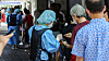 People wait for the Covid-19 test at the Gangdong District Public Health Office in eastern Seoul on Friday. [YONHAP]
