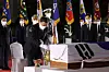 President Moon Jae-in pays respects to the remains of Hong Beom-do, a heroic Korean independence fighter repatriated from Kazakhstan 78 years after his death, at Seoul Air Base in Seongnam, Gyeonggi, in a late-night ceremony Sunday, coinciding with Liberation Day. [YONHAP]