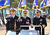 U.S. Pacific Fleet Commander Adm. John Aquilino, right, the prospective nominee to lead the U.S. Indo-Pacific Command, salutes troops with South Korea's Fleet Commander Vice Adm. Lee Seong-hwan, center, during his visit to South Korea in February. [NEWS1]an, center, during his visit to South Korea in February. [NEWS1]