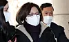 Park Hee-young, head of the Yongsan District Office, is questioned by reporters at the Seoul Western District Court on Monday where a hearing on her arrest warrant was held. [NEWS1]