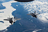 Two F-35A stealth fighter jets fly over Alaska in this photo from April 21, 2020, provided the U.S. Indo-Pacific Command. [U.S. INDO-PACIFIC COMMAND]