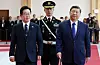 President Lee Jae Myung, left, walks with Chinese President Xi Jinping to hold a summit at the Gyeongju National Museum in North Gyeongsang on Nov. 1. [YONHAP]