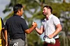 An Byeong-hun, left, and Grayson Murray shake hands on the 18th green during the final round of the Sony Open in Hawaii at Waialae Country Club in Honolulu, Hawaii on Sunday. [GETTY IMAGES]