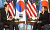 South Korean Prime Minister Han Duck-soo, left, holds talks with U.S. Vice President Kamala Harris at a Tokyo hotel on Tuesday. Han and Harris are in the Japanese capital to attend the state funeral for former Japanese Prime Minister Shinzo Abe. Harris will visit the Demilitarized Zone (DMZ) separating the two Koreas during a visit to South Korea this week, Han told reporters after the talks. [YONHAP]
