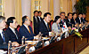 President Yoon Suk Yeol, center, speaks during a summit in Vietnam on Friday. Finance Minister Choo Kyung-ho and Industry Minister Lee Chang-yang are also in attendance. [YONHAP]