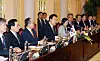 President Yoon Suk Yeol, center, speaks during a summit in Vietnam on Friday. Finance Minister Choo Kyung-ho and Industry Minister Lee Chang-yang are also in attendance. [YONHAP]