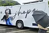 A bus wrapped with an advertisement to support J-Hope of boy band BTS as he starts his two-year military duty on Tuesday is parked outside the basic training camp in Wonju, Gangwon. Only a few fans and reporters were present at the scene and J-Hope did not stop to bid farewell. [YONHAP]