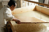 The late hanji craftsman Ryu Hang-young works on making traditional Korean paper. [CULTURAL HERITAGE ADMINISTRATION]