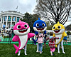 Pinkfong Baby Shark characters meet young local fans at the White House Easter Egg Roll event held in Washington on Monday. [THE PINKFONG COMPANY]