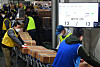 Workers sort boxes of exam papers and answer sheets for the Suneung, Korean College Scholastic Ability Test at a printing plant in Sejong on Monday morning, three days ahead of the exam. The boxes are shipped to storage facilities in 84 regional exam units nationwide. Exam papers will be distributed to 1,279 test sites on Thursday morning. [YONHAP]