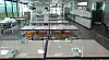 Teachers set up dividers on lunch tables at a high school in western Seoul on Monday, as they prepare for the first day of classes next week. [NEWS1]