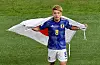 Japan's Ritsu Doan celebrates after the match as Japan qualify for the knockout stages after beating Spain on Thursday at Khalifa International Stadium in Doha, Qatar. [REUTERS/YONHAP]