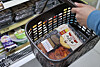 A Kim Hye-ja dosirak lunchbox is in a basket at a GS25 convenience store in Seoul on Monday. [YONHAP]