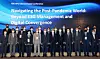 Institute for Global Economics (IGE) Chairman Emeritus Sakong Il, sixth from left, Financial Services Commission Chairman Koh Seung-beom, IGE Chairman Jun Kwang-woo and Shinhan Financial Group CEO Cho Yong-byoung pose for a photo at the IGE-SFG International Conference on Thursday. The conference was held in celebration of Shinhan Financial Group's 20th anniversary, discussing matters related to environmental, social and governance management. [SHINHAN FINANCIAL GROUP]