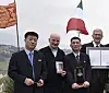 North Korea's former acting ambassador to Rome, Jo Song-gil, second from right, poses with Italian officials and civic leaders at an event in 2018, months before his disappearance in November of that year. [YONHAP]