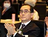 Rep. Thae Yong-ho, North Korea's former deputy ambassador to Britain, claps at a political event in February. [YONHAP]