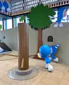 A kinetic installation of a millstone where visitors can try grinding the millstone along with Yumi's cells. [KIM YEON-AH]