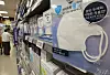 Boxes of disposable face masks are displayed at a discount mart in Seoul on Monday. [YONHAP]