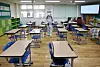 An official from the School Safety and Insurance Federation conducts a sterilization procedure to prevent the spread of the Covid-19 virus, on Tuesday at Daegu Gangrim Elementary School in Dalseong County, Daegu. [NEWS1]
