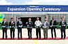 Executives of HD Hyundai Electric take a photo at a ceremony marking the completion of a construction of a power transformer storage facility in Alabama on July 26. [HD HYUNDAI ELECTRIC]