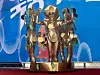 Four mothers dressed as Silla Dynasty's Gold Crown from Seobognchong Tumlus pose for photos on the red carpet of the ″Dress Like a Museum Exhibit″ ceremony at the National Museum of Korea in Yongsan District, central Seoul, on Sept. 27. [LEE JIAN]
