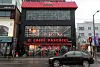 The windows of a cafe on the seafront in Busan are taped-up on Monday in a bid to stop the glass from shattering, as Typhoon Hinnamnor is expected to pass near the city on Tuesday. [YONHAP]