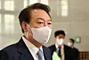 President Yoon Suk-yeol answers questions from reporters at the presidential office in Yongsan, central Seoul, on Friday. [JOINT PRESS CORPS]